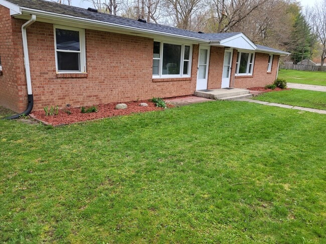 Building Photo - 6610 Carman Dr Unit 1