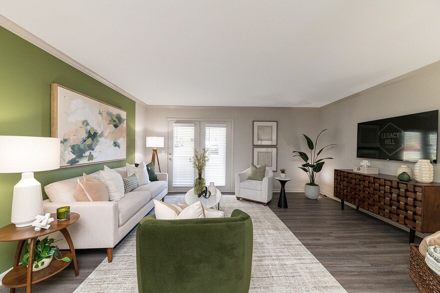 Spacious living room with hardwood-style flooring