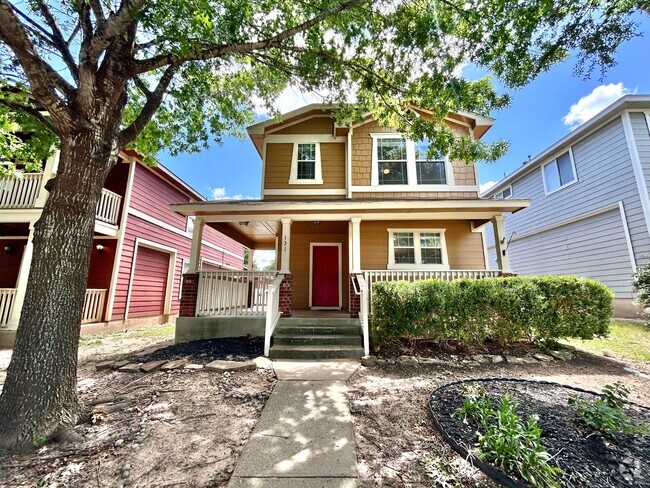 Building Photo - Charming 3BR/2BA Two-Level Home with Cover...