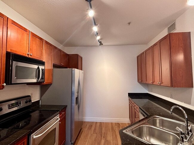 Photo - Stylish 1BD/1BA Condo with Garage & Balcony in Sought-After Englewood Location | $1,795/mo
