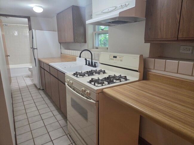 Building Photo - 4651 N Leamington Ave Unit G Rental