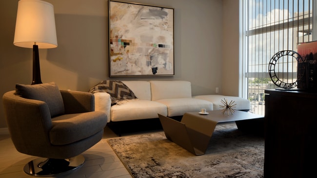 Oversized windows and tall ceilings offer a spacious feel