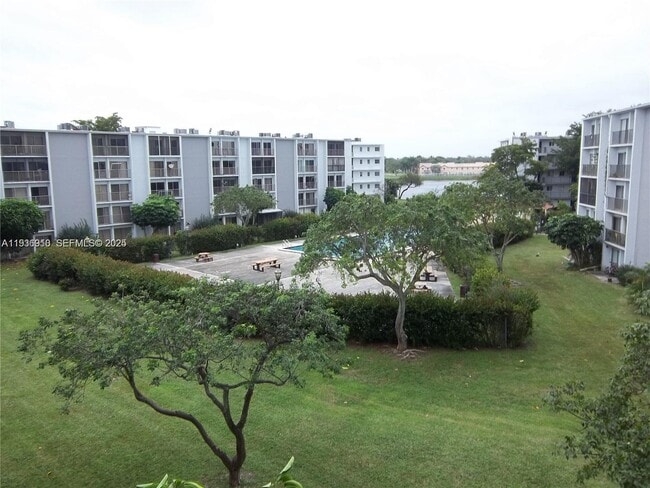 Building Photo - 8620 N Sherman Cir Unit 408