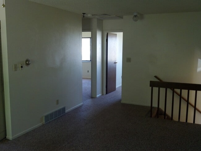 Photo - Widefield side entry bi-level home.
