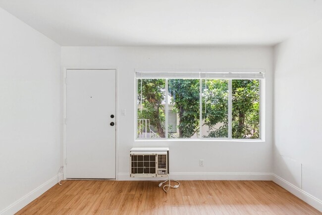 Building Photo - Montrose Residences Unit 6