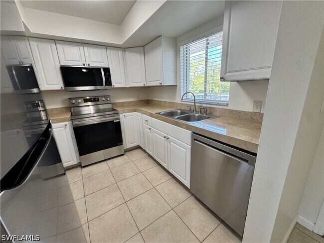 Photo - 12250 Tamiami Trl E Unit B-301