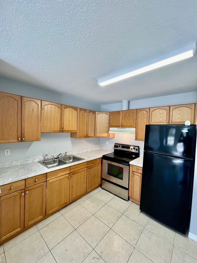 Photo - Conveniently Located 3BR/1BA Dade City Triplex NO APPLICATION FEE!