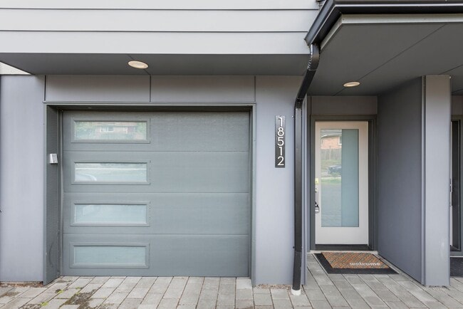 Photo - Modern 3 Bed 3.5 Bath Townhome with Garage, Balcony and Fenced Yard Near Light Rail