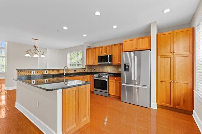 Photo - Private, light filled end unit townhome: 3 bed, 2.5 bath, 2,400 sq ft