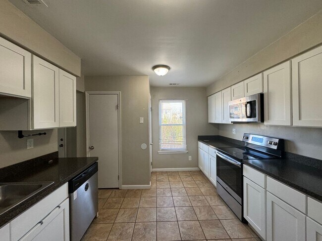 Photo - Introducing a stunning end unit town-home ...