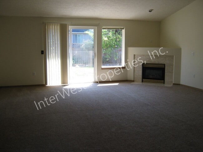 Photo - Ranch Style 3 Bedroom Gresham Home with 2 Car Garage, Gas Fireplace, & Yard!