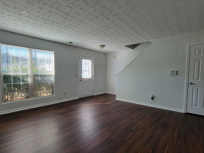 Photo - Experience modern living in this stunning two-story townhome! Awesome School District