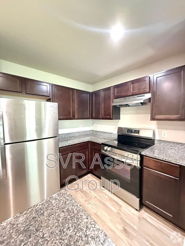Building Photo - 6468 Sweetbay Ln Unit 201 Rental