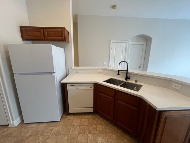 Photo - 2 story 2 bedroom - 2 bath - 1 car attached garage - 1182 sq feet -  in gated community. Unidad 101