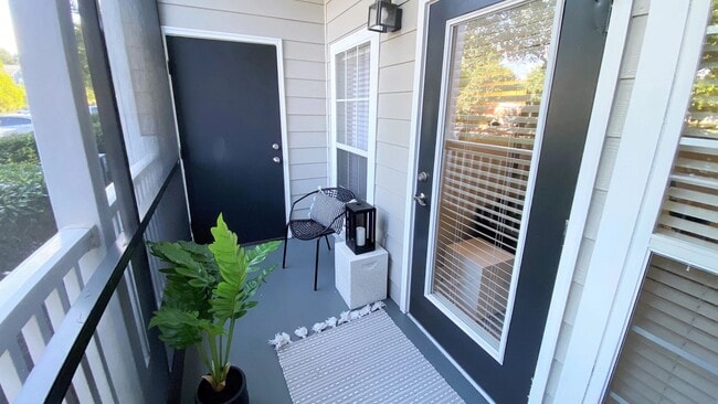 Indulge in serene outdoor living: relax and unwind on your private screened-in patio or balcony.
