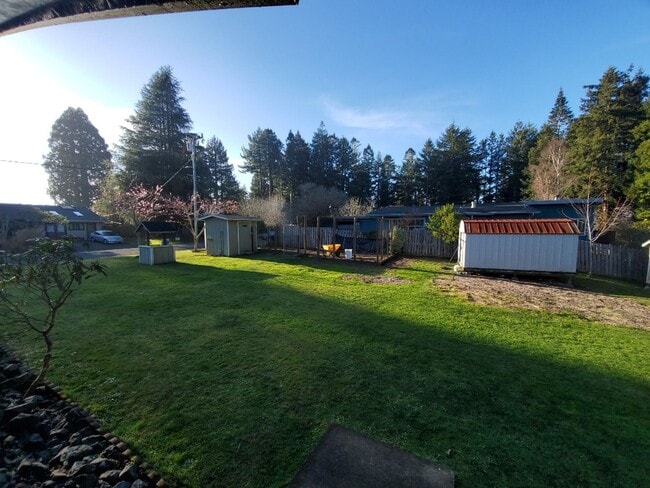 Building Photo - Spacious 1 bedroom with deck, wooded view & garden area. Most utilities included.