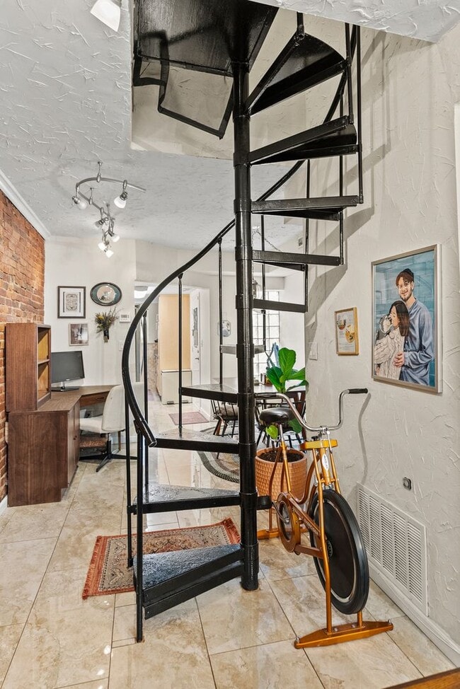 Photo - Charming Row Home | 2 Bed | 1 Bath | 950 Sf | Fenced Backyard | 2 Surface Parking Spaces