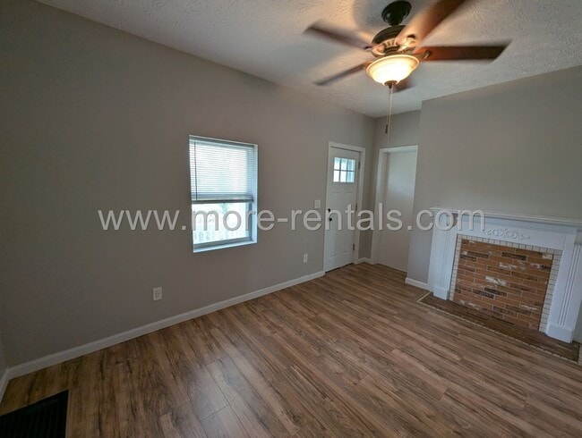 Photo - Remodeled home with fenced yard and large deck