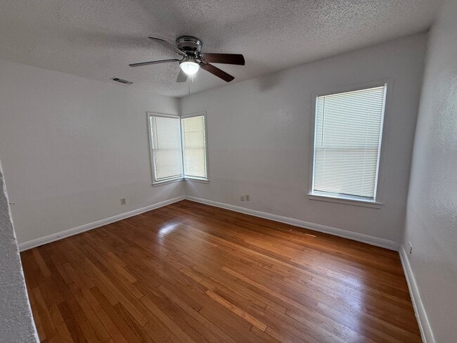 Photo - Charming 3BR Home w/ Hardwood Floors, Large Kitchen & Private Fenced Yard