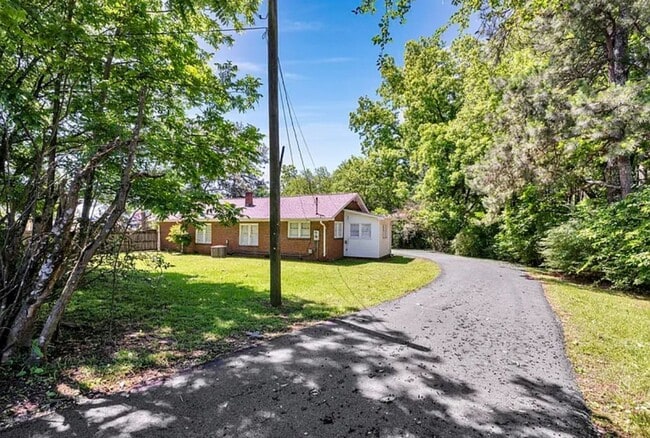 Photo - 4 bedroom 2 Bath - Available Now on Main A...