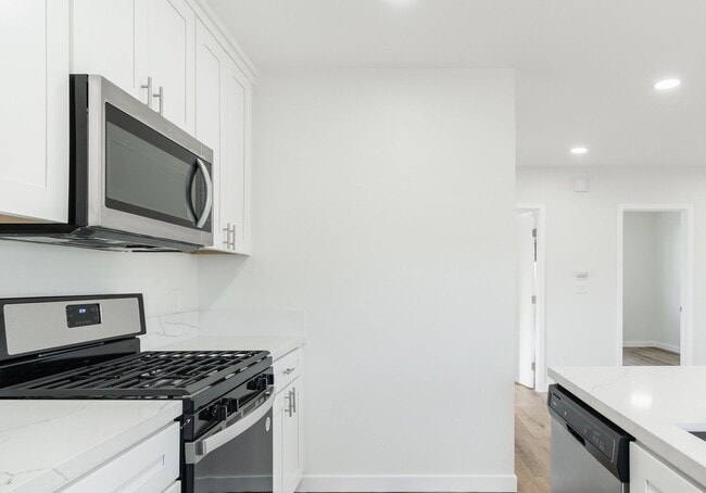 Photo - Welcome to your beautifully renovated single level home in the heart of Oceanside! Unit 305 Holly St.