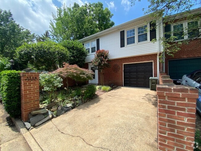 Building Photo - A fully updated Four Bedroom, Three and On... Rental