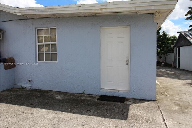 Building Photo - 16120 NW 45th Ave Unit B Rental