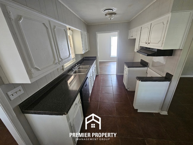 Photo - Spacious 4BR/2BA Home Near Hickory Hill | 1,805 Sq Ft, Hardwood Floors & Formal Dining Area