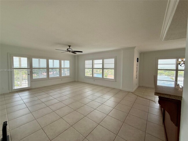 Building Photo - 10777 W Sample Rd Unit 1006 Rental