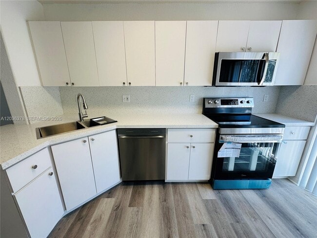 Building Photo - 5705 NW 109th Ave Unit 50