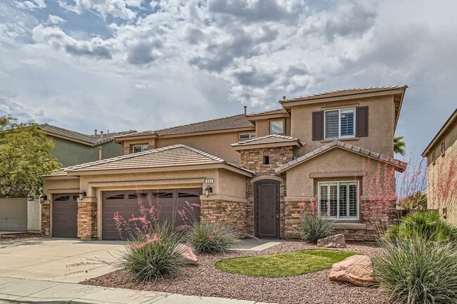 Building Photo - Gorgeous 5 bd, 3 1/2 bath, 3 car in gated community with strip and mountain views!