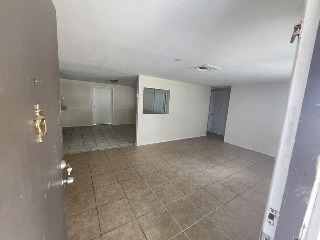 Front Door opens to Living Room