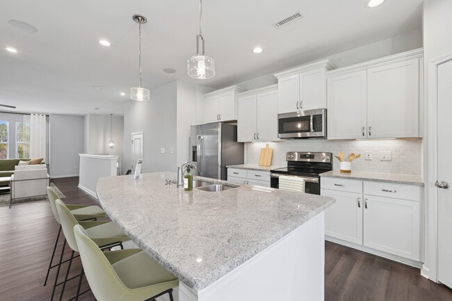 Upgrade Package Kitchen and dining area with hard-surface vinyl plank flooring