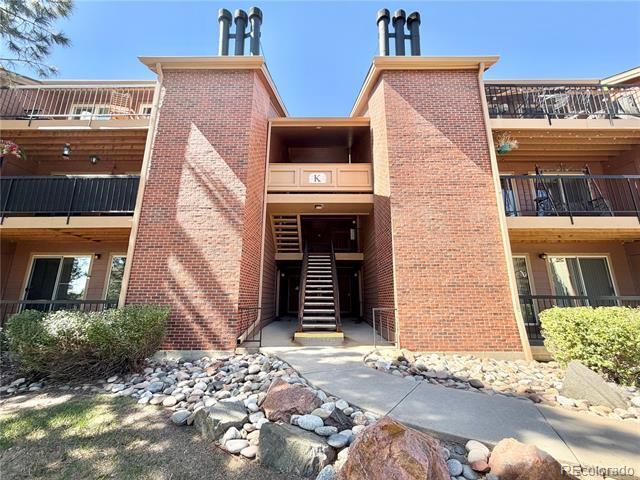 Building Photo - 4899 S Dudley St Unit 8K
