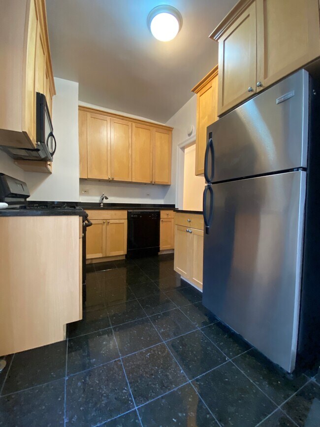 Kitchen - 114 W 13th St Apartments