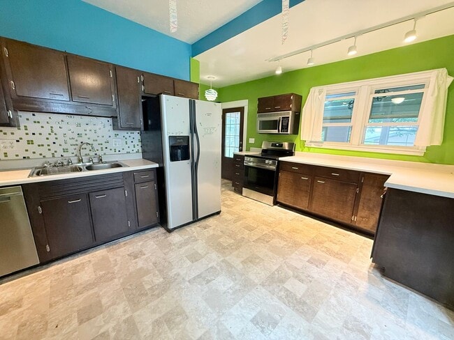 Photo - Beautifully Updated 3BR Home with Bonus 3-Season Room & Fenced Yard