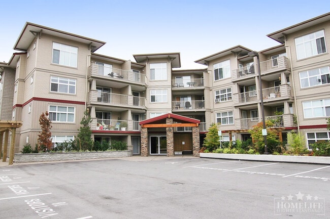 Building Photo - Modern 1 Bedroom + Den Condo with Mountain Views in Prime Abbotsford Location Unit 211