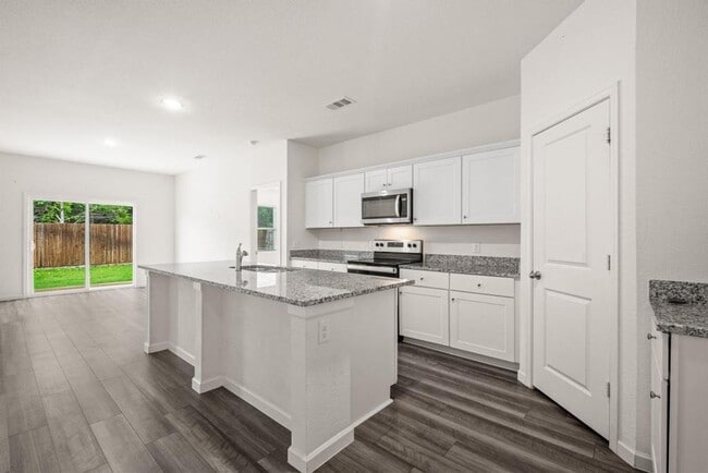 Photo - Backs to Wooded Area • Split Bedrooms • Modern & All-Electric