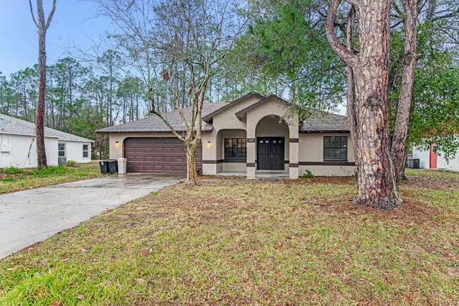 Charming 3-Bedroom, 2-Bath Home in Palm Coast - Charming 3-Bedroom, 2-Bath Home in Palm Coast