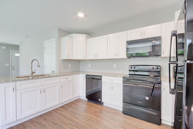 Photo - Two Story Duplex With Hardwood Flooring an...