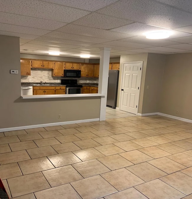 Kitchen and living room - 2007 Brookview Dr Apartments Unit Brookview C