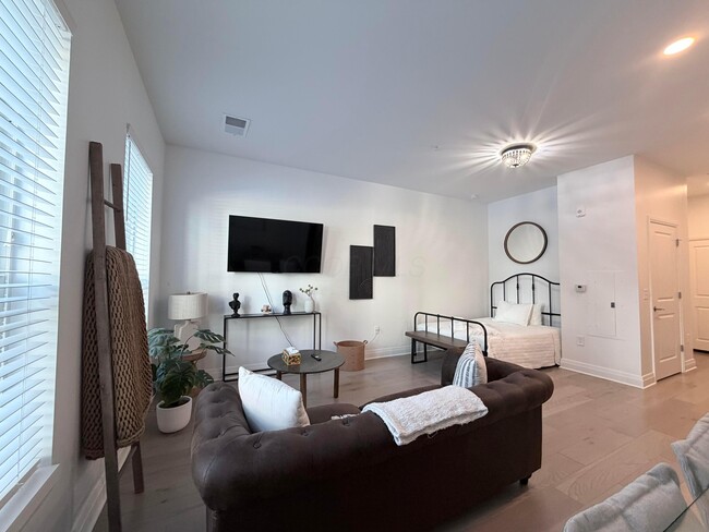 Building Photo - 6640 Mooney St Unit 203