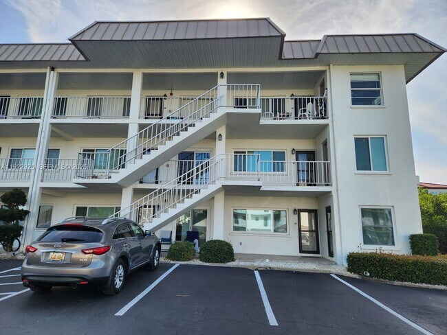Building Photo - 3320 Gulf of Mexico Dr Unit 208C
