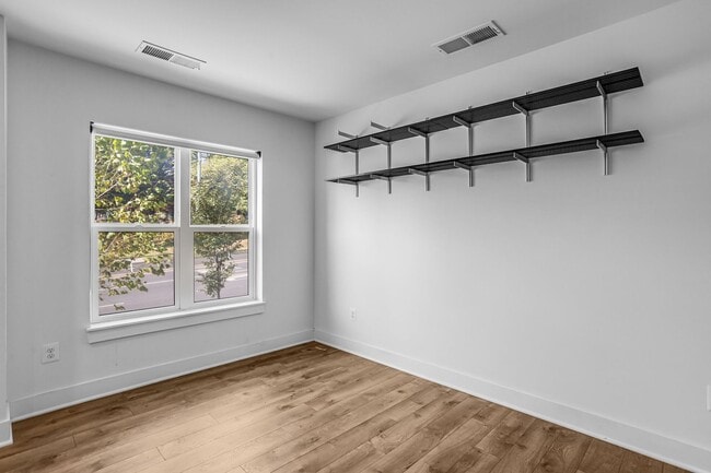 Photo - Spacious 4-level Home| 3 bedrooms + Garage parking!