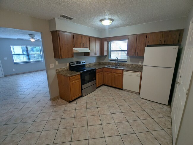 Photo - Spacious 2-Bedroom, 1-Bath First-Floor Condo for Rent. Furry friends welcome! Unit 6
