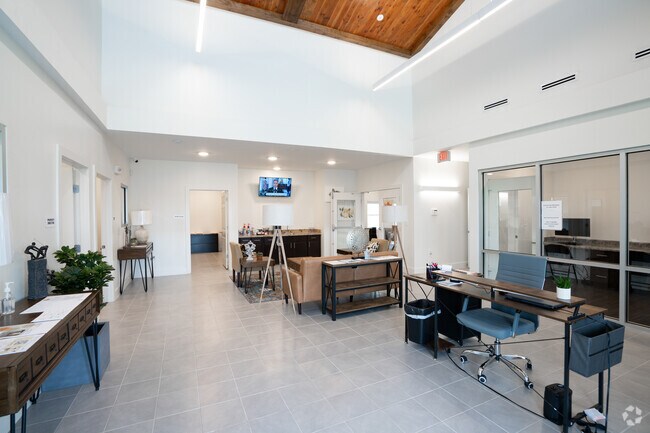 Entrada a la casa club de Sunland Country Apartments - Sunland Country