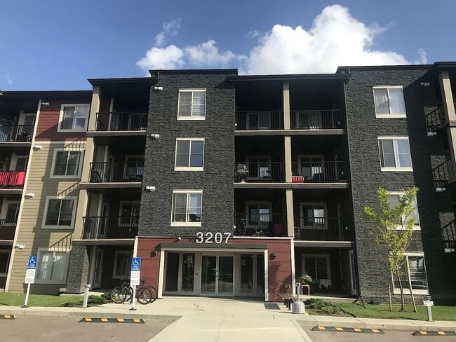 Building Photo - 3207 James Mowatt Trl SW Unit 402