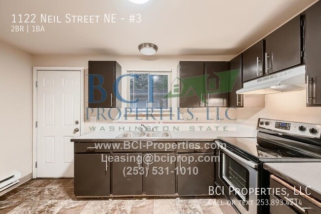 Building Photo - 1122 Neil St NE Unit #3