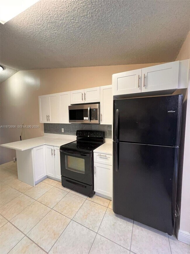 Photo - 7735 W 29th Way Unit 202