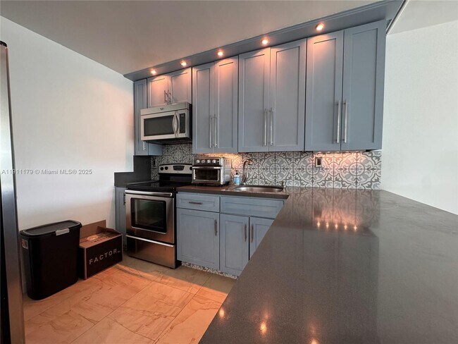 Photo - 8233 Harding Ave Unit 403